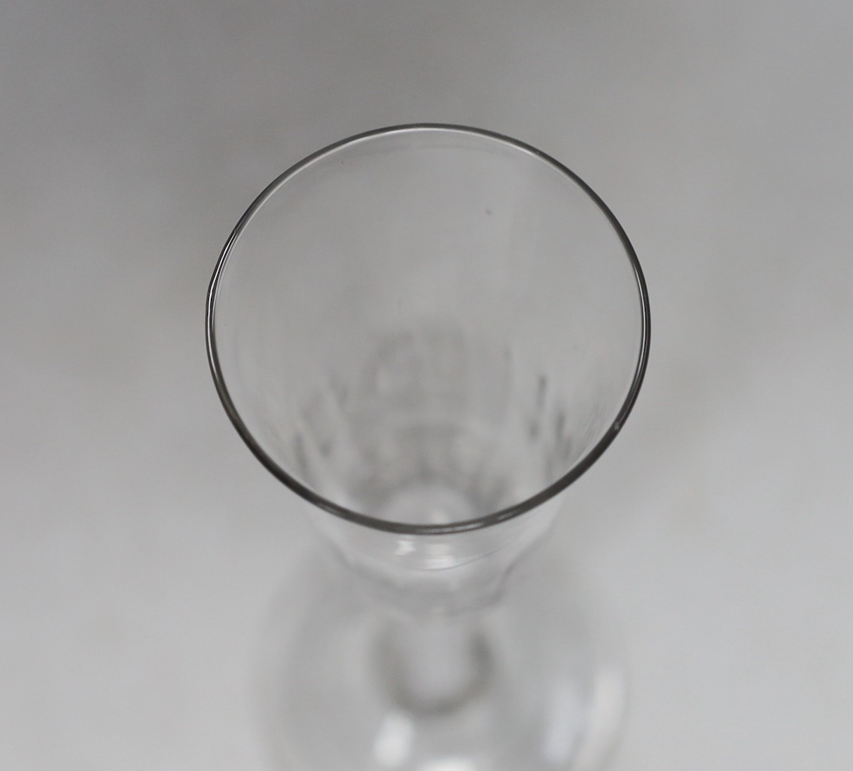 A George III DSOT stem ale glass. 19cm tall